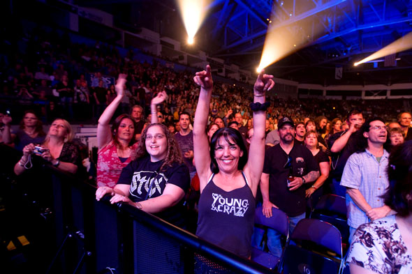 Fans rock along with Styx as they play "Too Much Time".(Scott Eklund/Red Box Pictures)