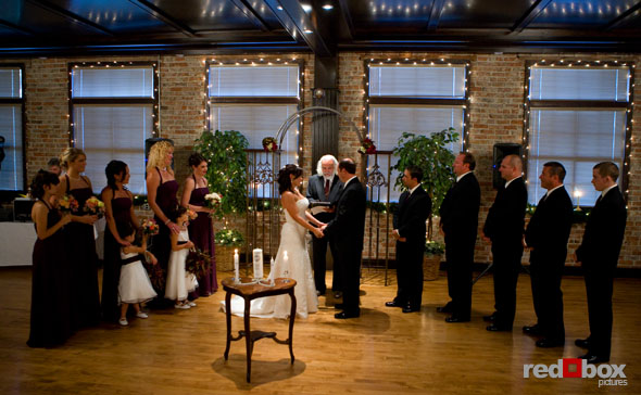 The wedding party during the ceremony. (Photo By: Scott Eklund/Red Box Pictures)