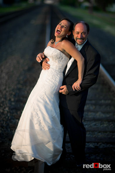 Michelle & Matt take a walk along the railroad tracks. (Photo By: Scott Eklund/Red Box Pictures)