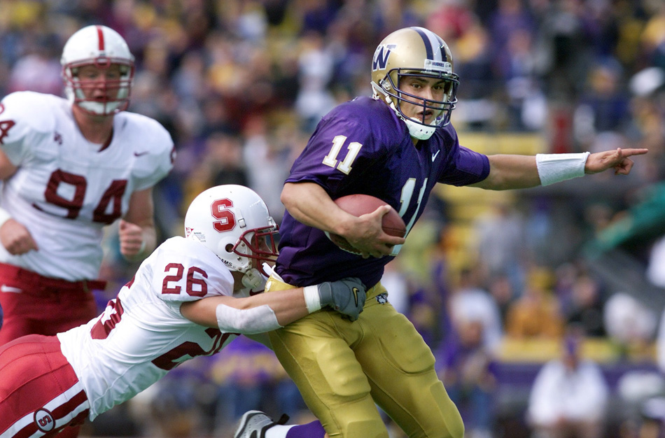 1999 P-I SSY Marques Tuiasosopo rushing for a first down during the second quarter of UW's victory over Stanford. (Dan DeLong/Seattle Post-Intelligencer)
