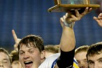 2010 nominee Ferndale quarterback Jake Locker hoists the first place trophy following Ferndale's 47-12 win over Prosser in the 3A Washington State Championship game played in December of 2005. (Scott Eklund/Seattle Post-Intelligencer)