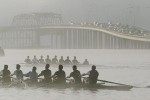 2010 nominee the UW mens' crew team practice on Lake Washington in the early morning as commuters drive over the Evergreen Point Bridge.( Dan DeLong/Seattle Post-Intelligencer)