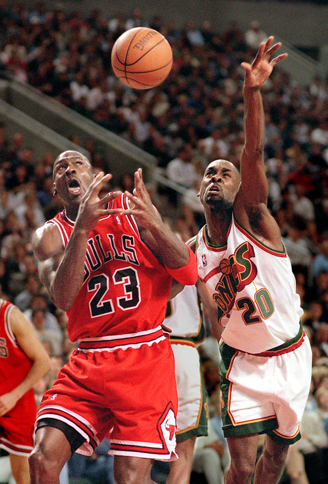1997 SSY winner Gary Payton swipes the ball from MJ during the 1996 season that saw Jordan's bulls top the Sonics in the NBA Finals. (Scott Eklund/Seattle Post-Intelligencer)