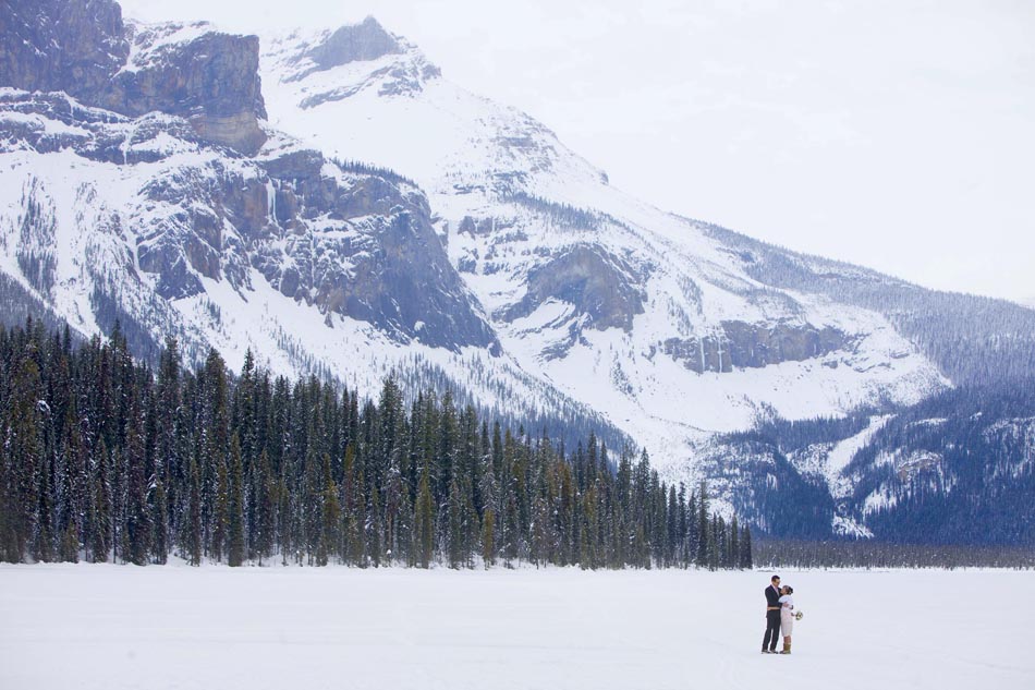 The mountains that surround Lake Louise make for a beautiful backdrop for Karen & Steve. (Photography by Scott Eklund/Red Box Pictures)