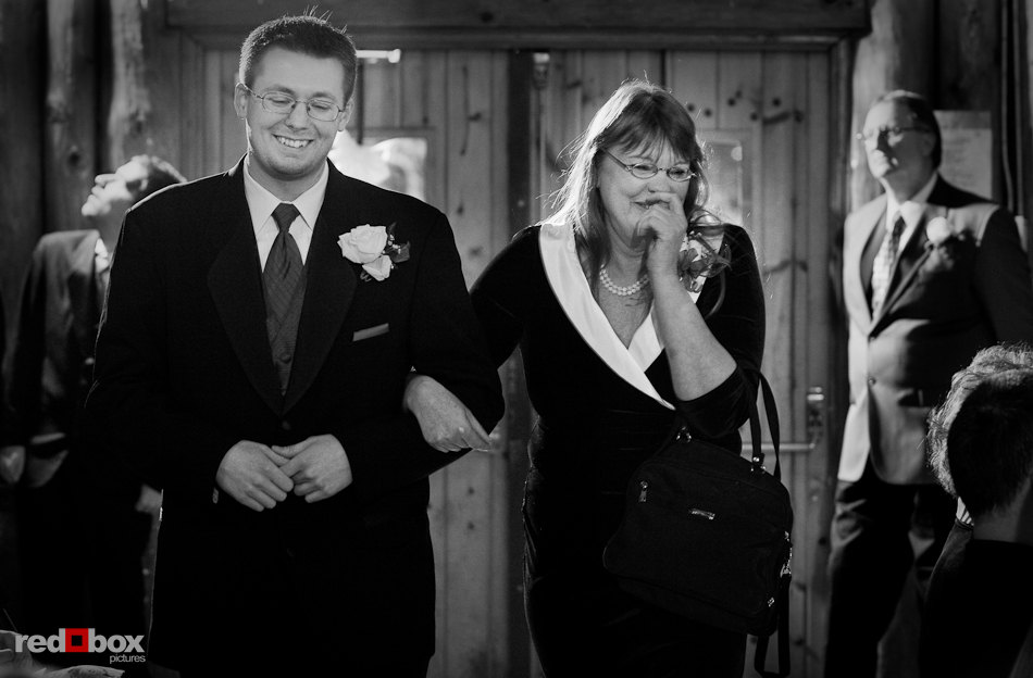 Phil the groom escorts his mom to her seat before the wedding ceremony at the Hillcrest Lodge in Mt. Vernon, WA. (Photography by Rob Sumner / Red Box Pictures)