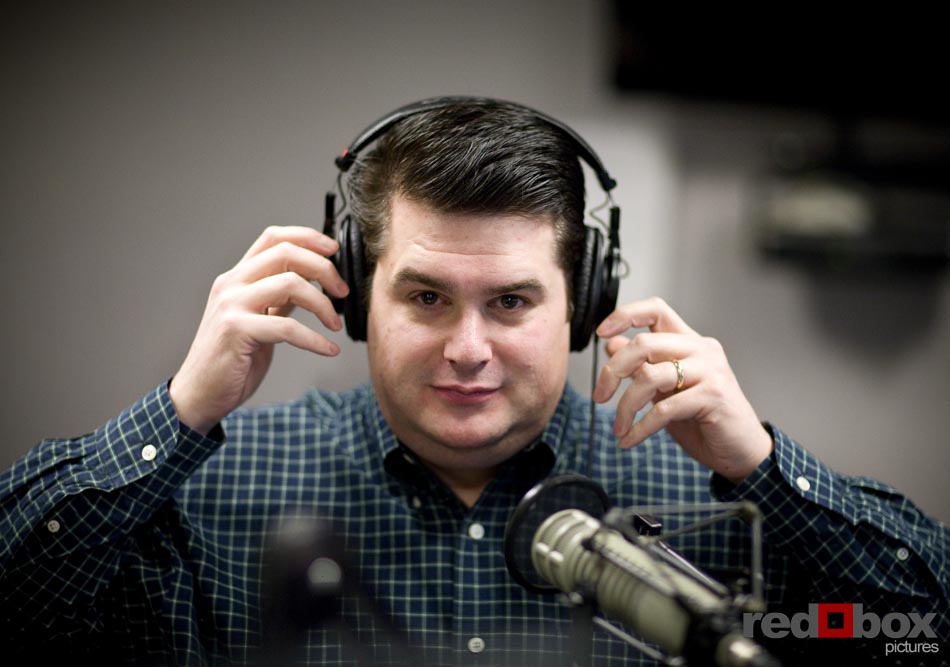 DJ Greg Lowder adjusts his headset as he begins his first show on Nearlywed Radio. (Photography by Scott Eklund/Red Box Pictures)
