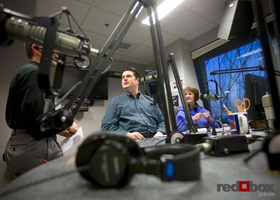 Gayle O'Donnell (right) and Greg Lowder talk with Eddie Redman of Grand Event Rentals in the studio for their first show.(Photography by Scott Eklund/Red Box Pictures)
