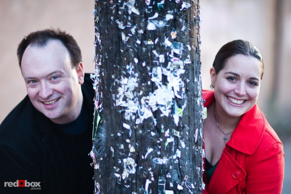 Tara and Brian with an flyerless telephone pole in old Ballard during their Seattle engagement session. (Photography by Andy Rogers/Red Box Pictures)
