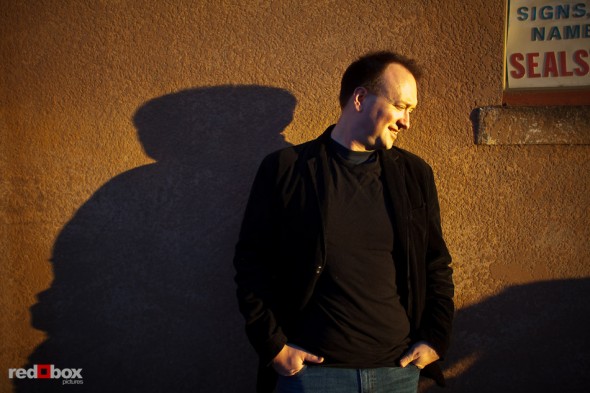 Brian in the setting sun in old Ballard during his Seattle engagement portrait session. (Photography by Andy Rogers/Red Box Pictures)