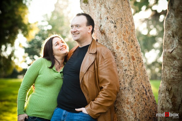 Tara and Brian in the sunset at the Ballard Locks during their engagement shoot. (Photography by Andy Rogers/Red Box Pictures)