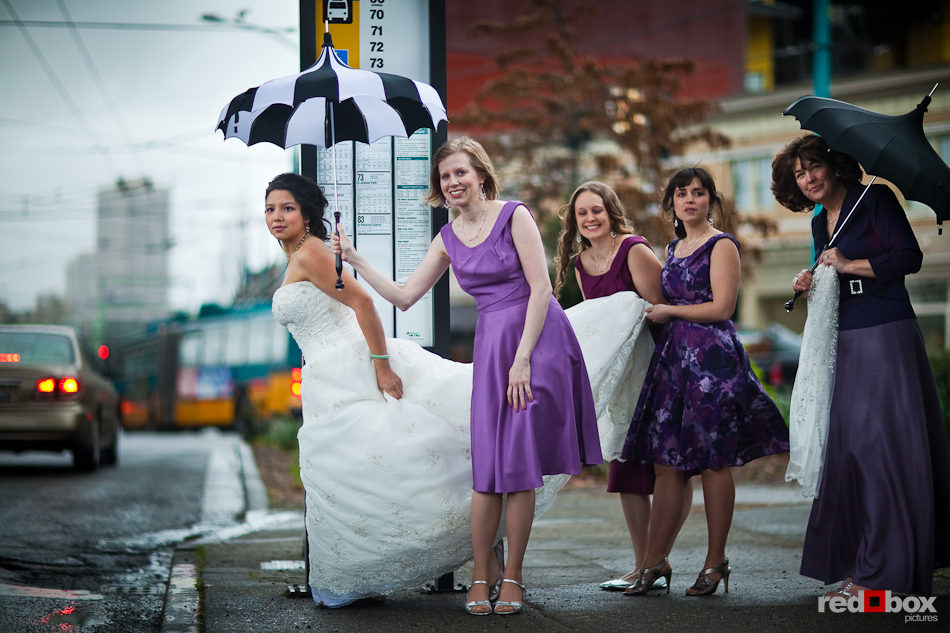 Sarah and her bridesmaids at the bus stop across from the Lake Union Cafe in Seattle. (Photo by Andy Rogers/Red Box Pictures)