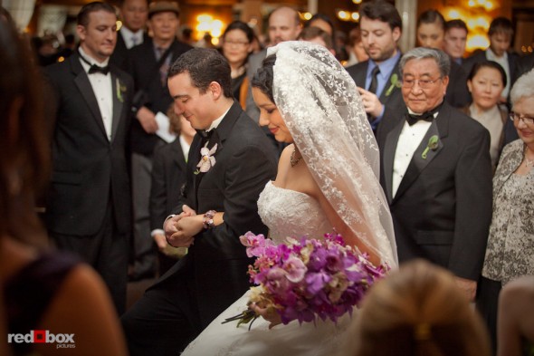 Sarah and Kris walk down the aisle during their wedding ceremony at the Lake Union Cafe in Seattle. (Photo by Rob Sumner/Red Box Pictures)