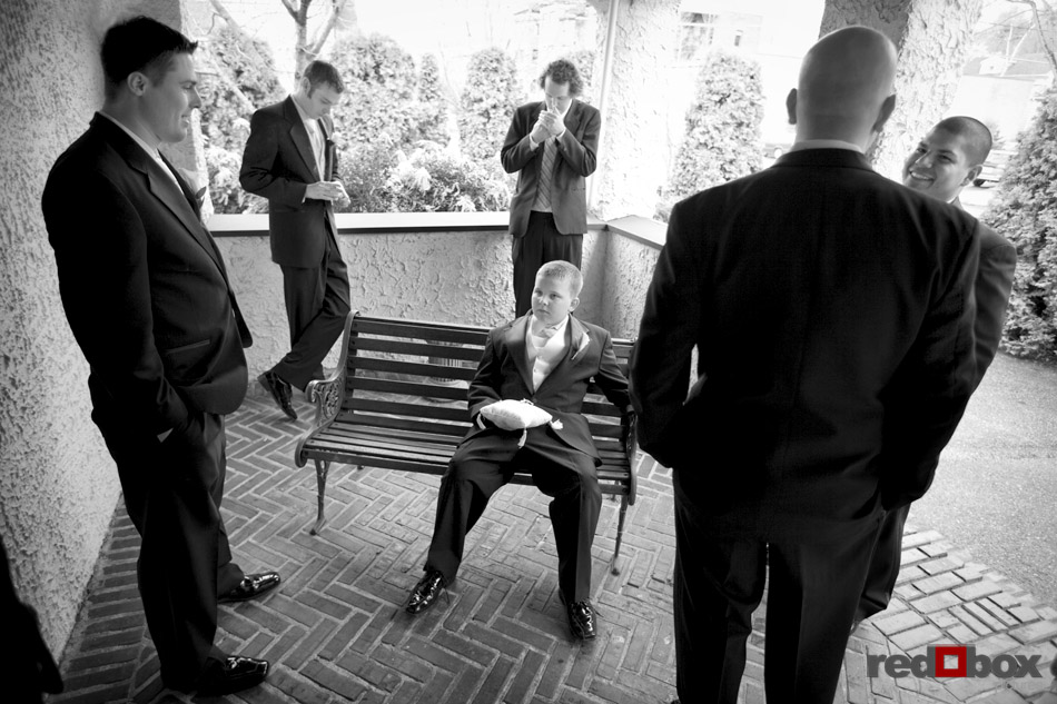 The groom and groomsmen wait prior to the start of the wedding at the Bacon Mansion on Capitol Hill in Seattle. Wedding Photography By Scott Eklund/Red Box Pictures