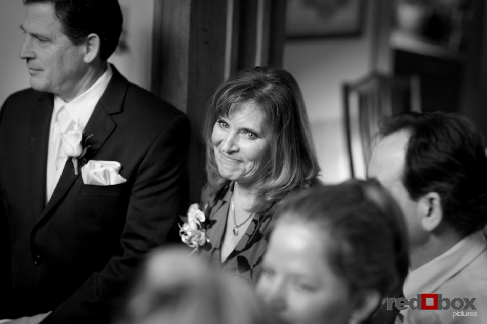 The mother of the groom smiles at her son prior to the wedding at the Bacon Mansion in Seattle on Capitol Hill. Photography: Scott Eklund/Red Box Pictures