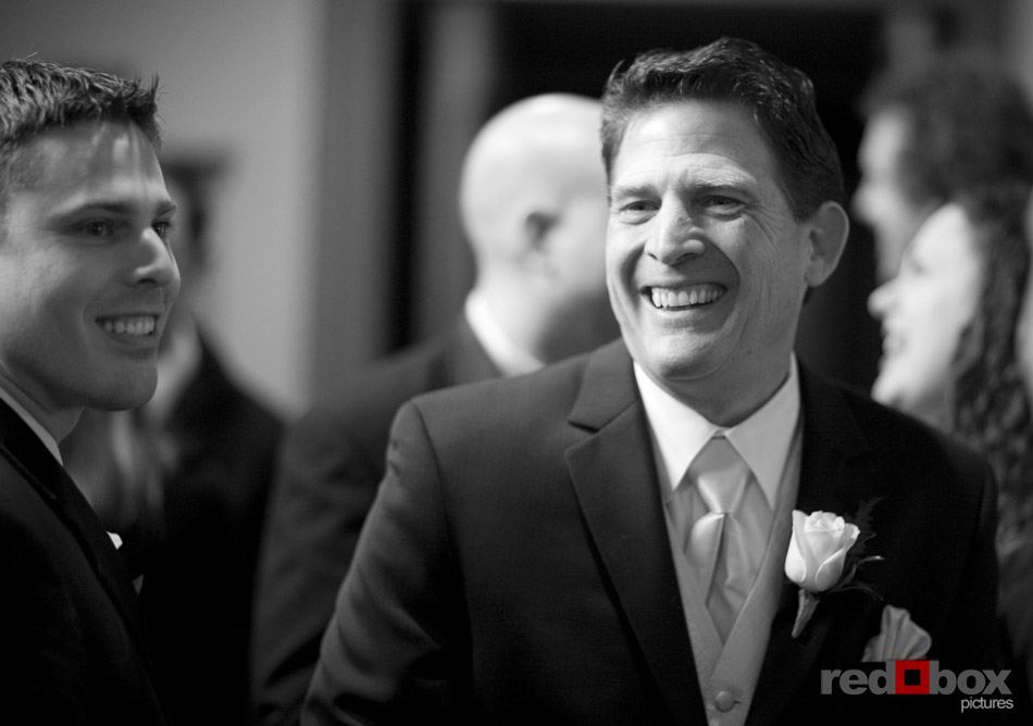 The father of the groom smiles during the wedding at the Bacon Mansion in Seattle on Capitol Hill. Wedding Photography Red Box Pictures Scott Eklund 