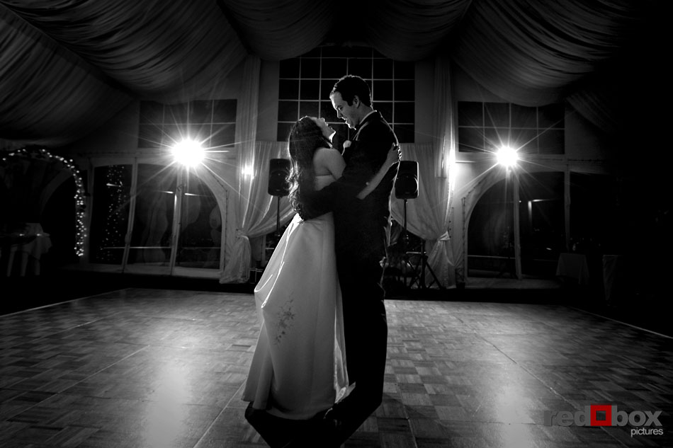 The bride and groom take their first dance at their wedding reception at The Golf Club at Newcastle. (Photography by Scott Eklund/Red Box Pictures)