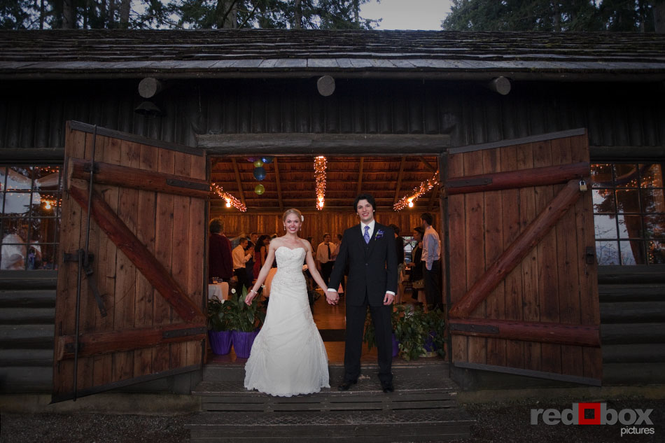 A portrait of the bride and groom at the reception at their Kitsap Memorial State Park wedding in Poulsbo, WA. Seattle Wedding Photographers Red Box Pictures Scott Eklund