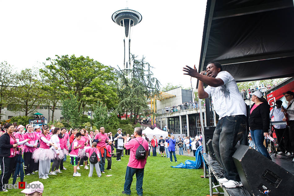 Spectators enjoy the show on Fisher Pavilion lawn during the 2010 Susan G. Komen Race for the Cure in Seattle on Sunday, June 6, 2010. (Photo by Dan DeLong/Red Box Pictures)