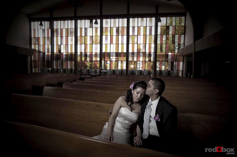 Johnna & Neel spend a moment together after their wedding at St. Louise Catholic Church in Bellevue. (Wedding Photography Scott Eklund Red Box Pictures Seattle)