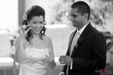 Johnna flashes Neel's ring during their wedding at St. Louise Catholic Church in Bellevue. (Wedding Photography Scott Eklund Red Box Pictures Seattle)