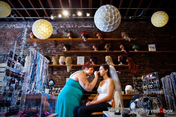 Laura has her makeup done at Vain in Seattle before her wedding to Nathan at the Novelty Hill Januik Winery in Seattle. (Photo by Dan DeLong/Red Box Pictures)
