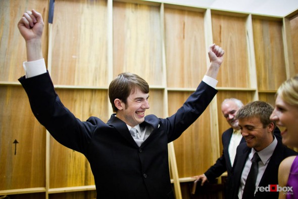 Dan celebrates his marriage to Kate after their wedding at the Georgetown Studios in Seattle. (Photo by Dan DeLong/Red Box Pictures)
