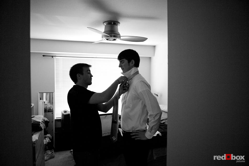 Dan gets some help with his tie while getting ready for his wedding to Kate in Seattle. (Photography by Andy Rogers/Red Box Pictures)