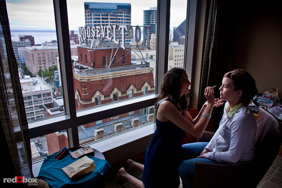 Maureen has her makeup done in suite at the Seattle Grand Hyatt Hotel prior to her ceremony at the Georgetown Ballroom. (Photo by Andy Rogers/Red Box Pictures)