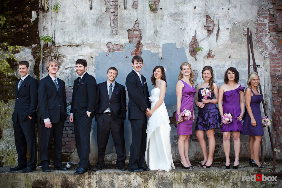 Kate and Dan's wedding party pose outside at the Georgetown Studios in Seattle. (Photo by Dan DeLong/Red Box Pictures)