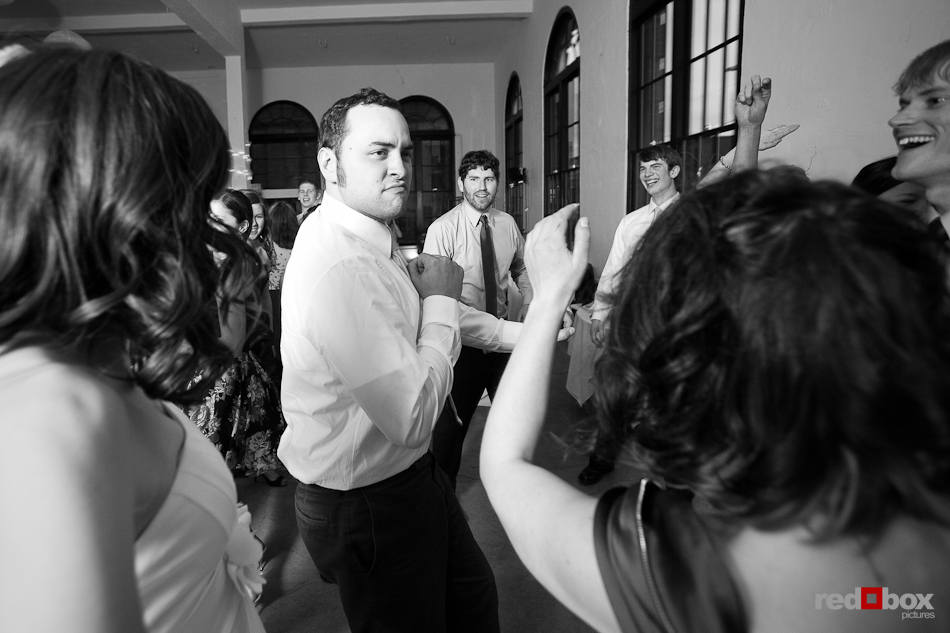 Guests show their moves while dancing at Kate and Dan's wedding at the Georgetown Studios in Seattle. (Photo by Dan DeLong/Red Box Pictures)