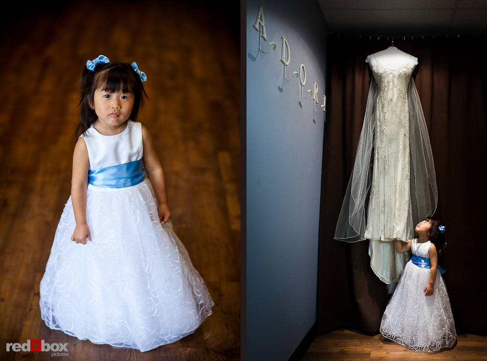 Nobuyo's niece and flower girl admires her wedding dress as the bride has hair and makeup done at Adore in Seattle prior to her wedding aboard the Virginia V. Photo by Seattle wedding photographer Andy Rogers of Red Box Pictures.