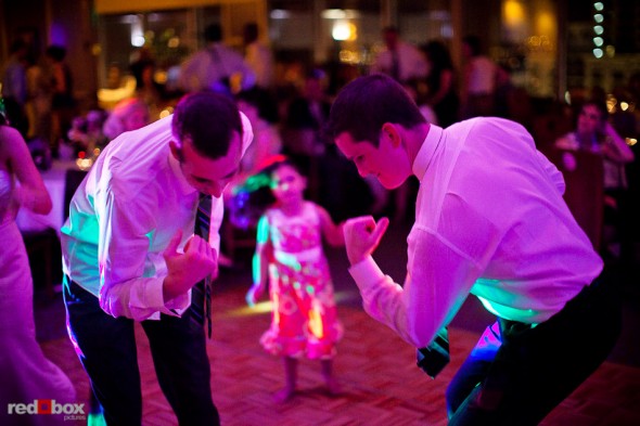The groom dances with a friend during his wedding reception at The Harbor Club Seattle Saturday. (Photos by Andy Rogers/Red Box Pictures)