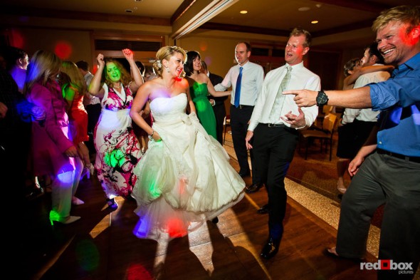 Angi and Mike dance with guests their wedding at The Willows Lodge in Woodinville, WA. (Photo by Dan DeLong/Red Box Pictures)