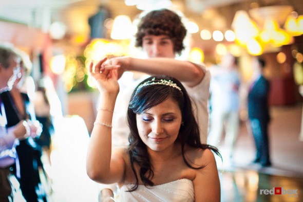 Anghi and Andy dance at The Canal in Seattle's Ballard neighborhood after their wedding there. (Photo by Dan DeLong/Red Box Pictures)