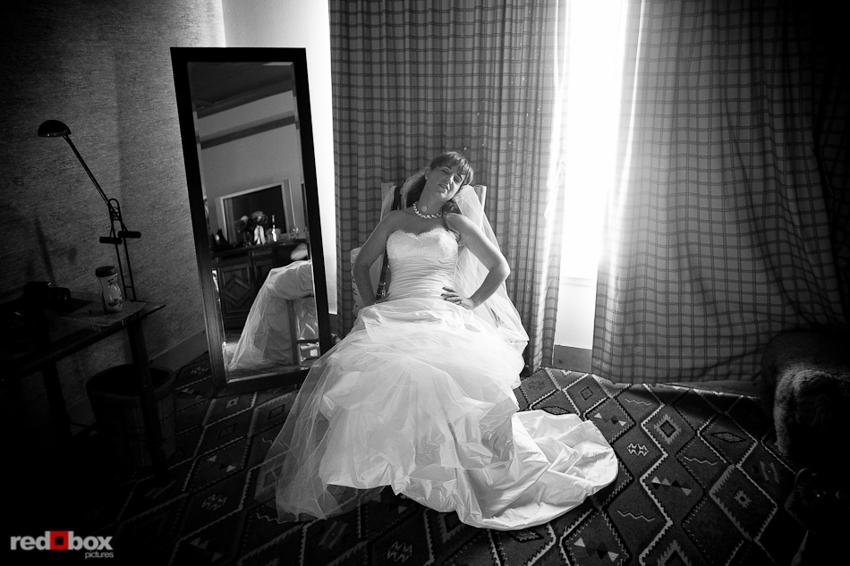 Megan rests momentarily in her room prior to her wedding ceremony at Six|Seven at the Edgewater Hotel in Seattle Saturday, Aug. 28, 2010. (Photo by Andy Rogers/Red Box Pictures)