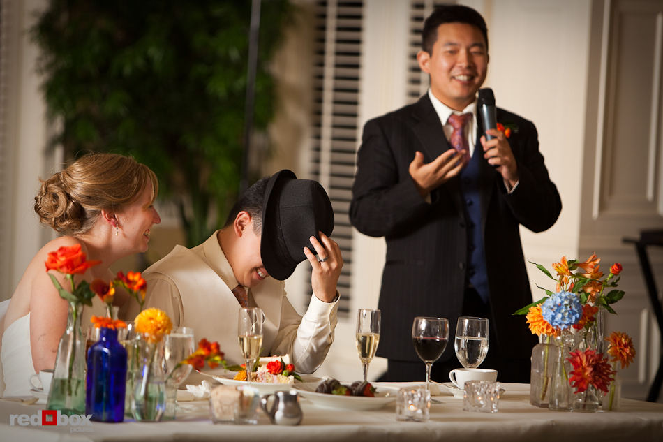 Groom covers his head while his best man gives toast during wedding at the Golf Club at Newcastle. (Photo by Rob Sumner/Red Box Pictures)