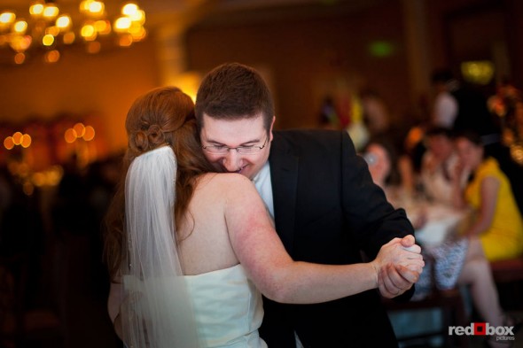 Newlyweds Katherine and Bryan share their first dance at the Women's University Club in Seattle. (Photo by Dan DeLong/Red Box Pictures)