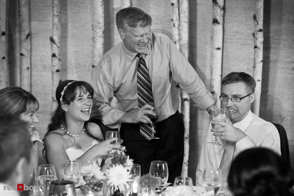 Megan and Charlie laugh with her father during their wedding at Six|Seven at the Edgewater Hotel in Seattle Saturday, Aug. 28, 2010. (Photo by Andy Rogers/Red Box Pictures)