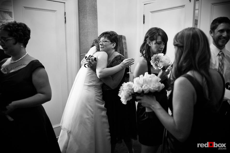 Katherine is congratulated by family after being married at Seattle's Women's University Club. (Photo by Dan DeLong/Red Box Pictures)