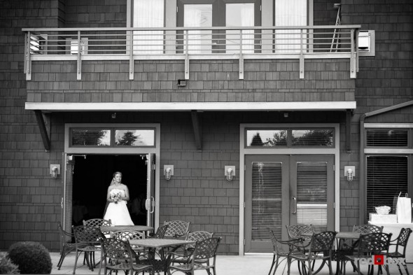 Angi stands in the doorway of before walking down the aisle to marry Mike during their wedding at Willows Lodge in Woodinville, WA on Sunday, August 29, 2010. (Photo by Dan DeLong/Red Box Pictures)