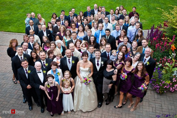 Suzy and Michael pose with their guests after being married at Kiana Lodge in Poulsbo, WA. (Photo by Andy Rogers/Red Box Pictures)
