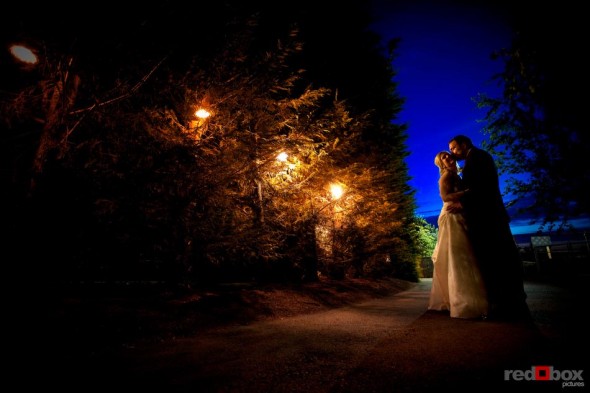 The bride and groom share a moment outside the Hall at Fauntleroy in Seattle, Washington. Seattle Wedding Photography Red Box Pictures Scott Eklund