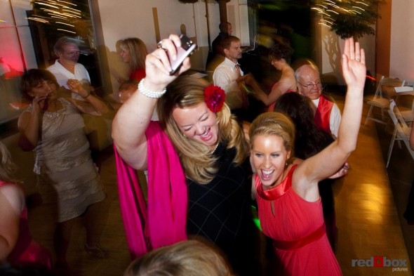 Guests dance it up during the reception at The Hall at Fauntleroy in Seattle, Washington. Seattle Wedding Photographer Red Box Pictures Scott Eklund