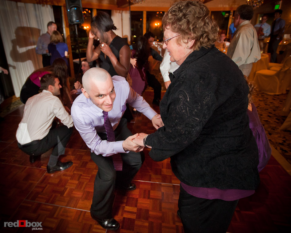 Lisa's brother and grandmother dance during the wedding reception at the Edgewater Hotel. (Photo by Andy Rogers/Red Box Pictures)