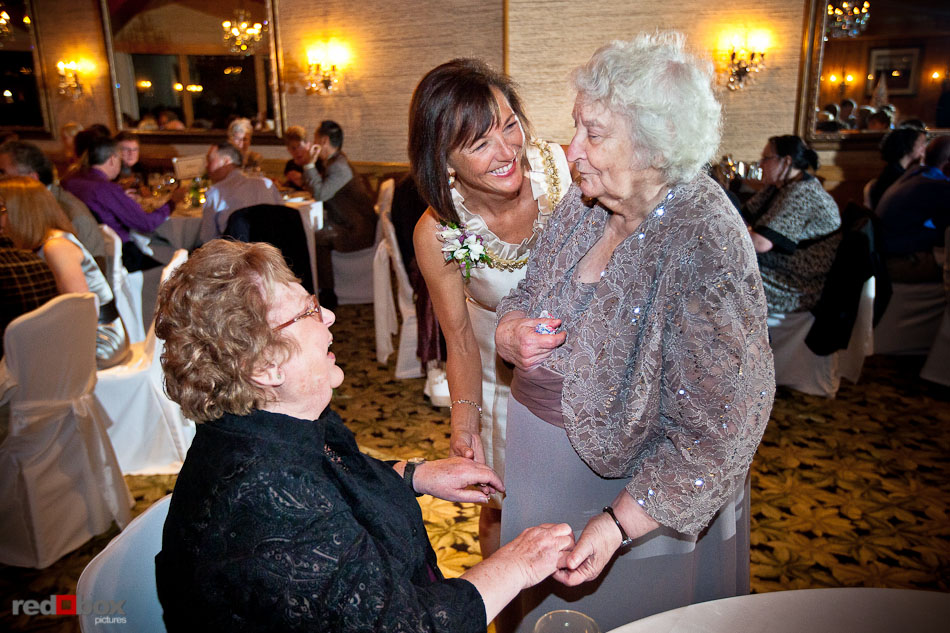 Alex's mother with two grandmothers during the wedding reception at the Edgewater Hotel in Seattle (Photo by Andy Rogers/Red Box Pictures)