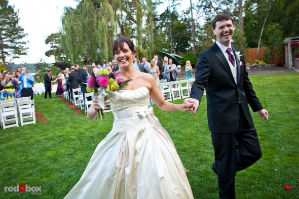 Just married, Suzy and Michael enjoy the moment at Kiana Lodge in Poulsbo, near Bainbridge Island, WA. (Photo by Dan DeLong/Red Box Pictures)