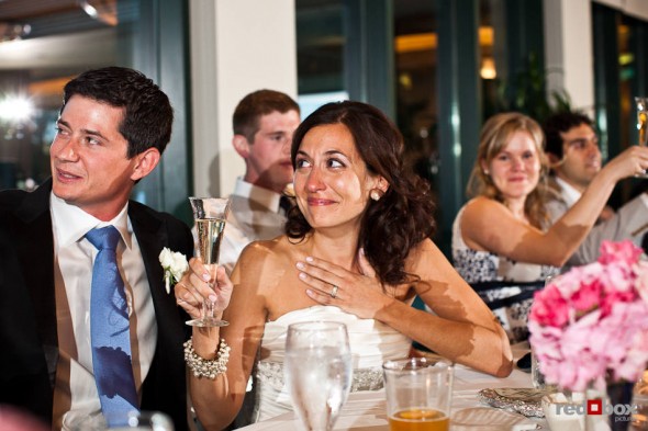 Nadine, with her new husband Brian, becomes emotional during toasts at their wedding reception at the Plateau Club in Sammamish, WA. (Photo by Dan DeLong/Red Box Pictures)