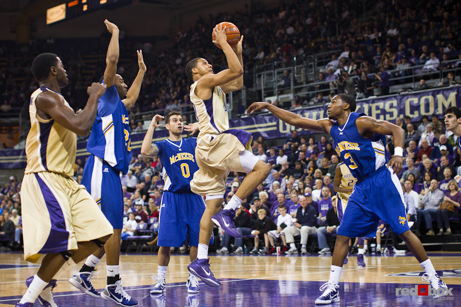 Washington Huskies guard Abdul Gaddy drives to the basket and scores against McNeese State Cowboys during the season opener at UW's Hec Edmundson Pavilion. (Photo by Dan DeLong/Red Box Pictures)