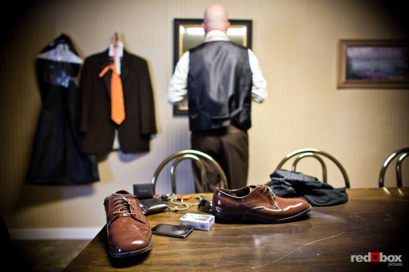 Ted gets dressed in the groom's room before his wedding with Liz at Hidden Meadows in Snohomish, WA. (Photo by Dan DeLong/Red Box Pictures)