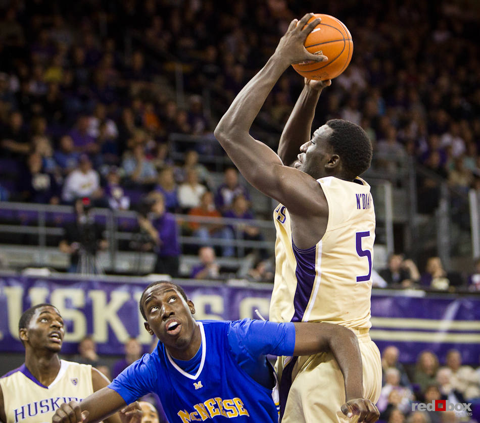Washington Huskies' 7-foot center Aziz N'Diaye goes up for a shot against the McNeese State Cowboys during the men's basketball season opener at UW's Hec Edmundson Pavilion. (Photo by Dan DeLong/Red Box Pictures)